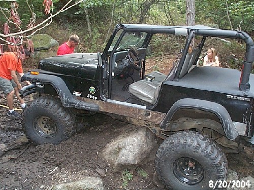 Black Jeep Wrangler off-roading