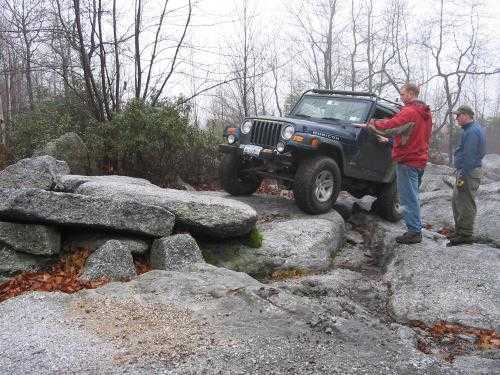 Jeep navigating rocky trail