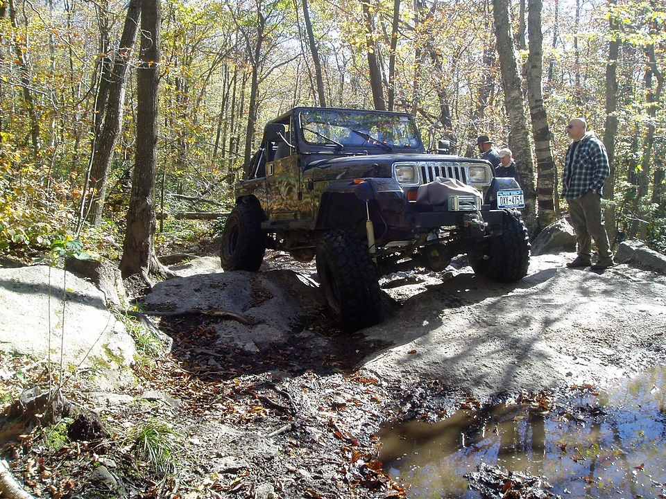 Jeep navigating rocky trail