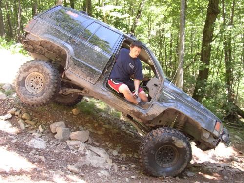Person in lifted Jeep, Long Island Off Road