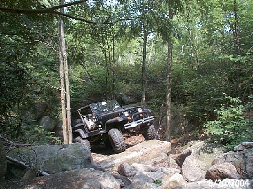 Black Jeep on rocks, Long Island Off Road