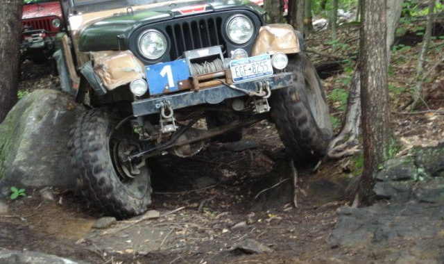 Jeep #1 navigating rocky trail
