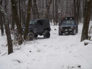 Two Jeeps on snowy trail
