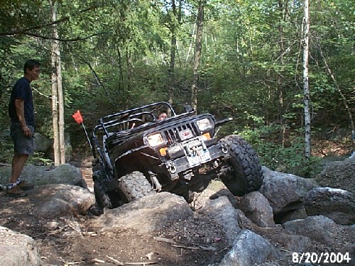 Jeep navigating rocky terrain