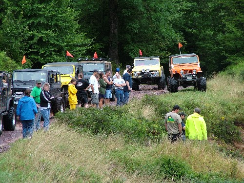 Off-road enthusiasts gather near Jeeps