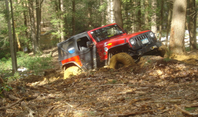 Red Jeep stuck in mud, Long Island Off Road