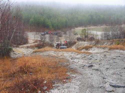 Off-road vehicles in wooded area