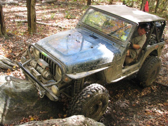 Jeep navigating rocky trail