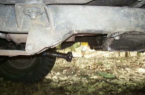 Undercarriage view of rusty vehicle