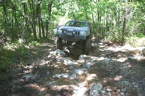 Jeep navigating rocky trail