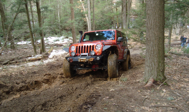 Orange Jeep in mud, Long Island Off Road