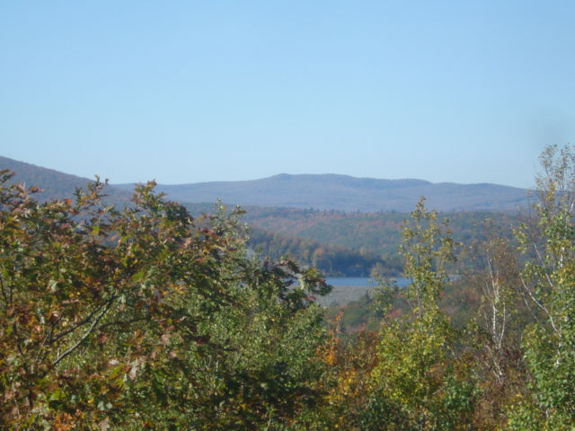 Scenic autumn landscape view with lake