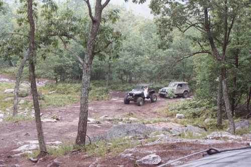 Two Jeeps on a muddy trail, Long Island Off Road