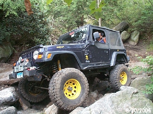 Jeep on rocks, off-roading