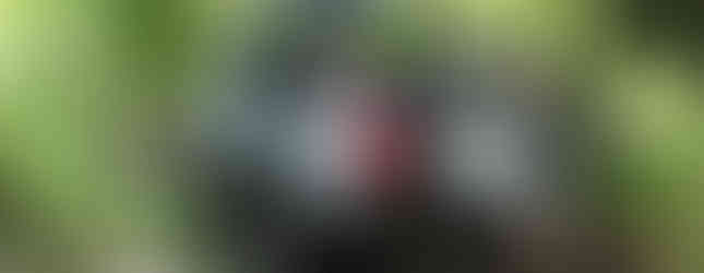 White Jeep traversing rocky trail