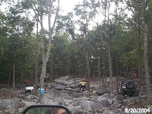 Off-road vehicles on rocky trail
