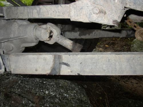 Close-up of rusty vehicle driveshaft