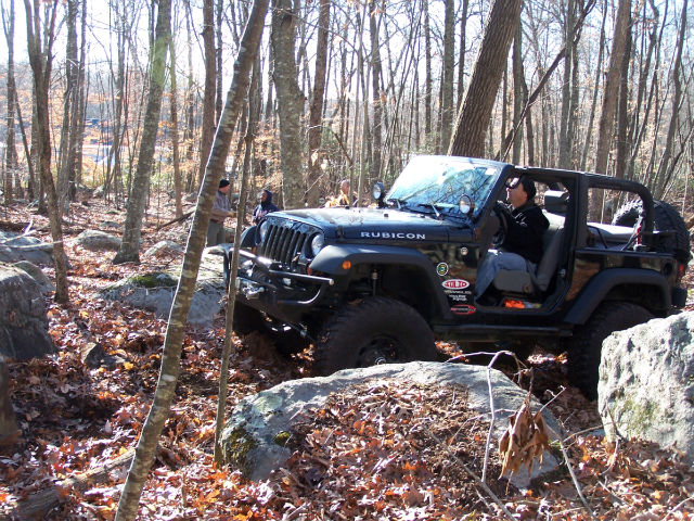 Man driving Jeep Wrangler off-road