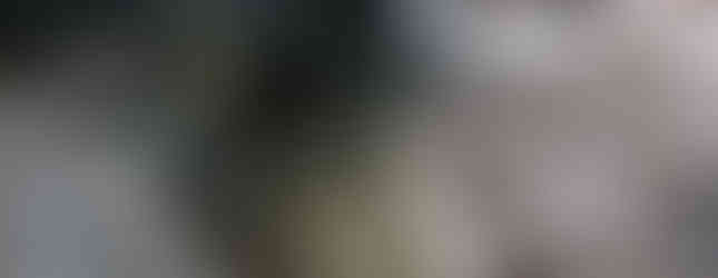 Jeep overcoming rock obstacle