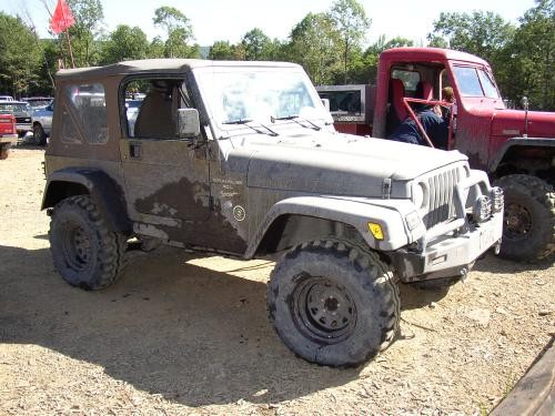 Muddy Jeep Wrangler off-road