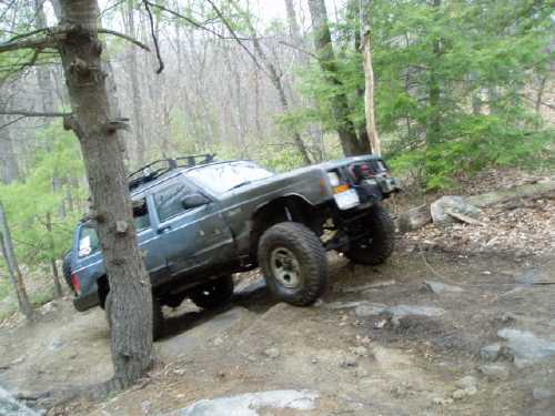 Jeep navigating rugged terrain