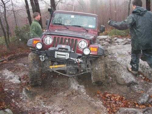 Jeep traversing rocky terrain