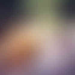 Yellow Bronco flipped on rocks; people watching