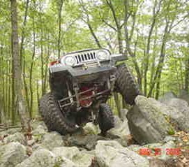 Jeep navigating rocky terrain; Long Island Off Road