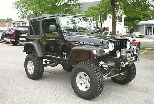 Black Jeep Rubicon lifted with large tires