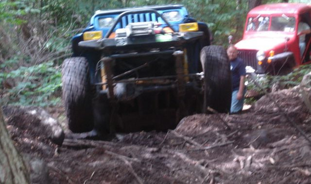 Blue Jeep stuck in mud, TrailFest off-road adventure
