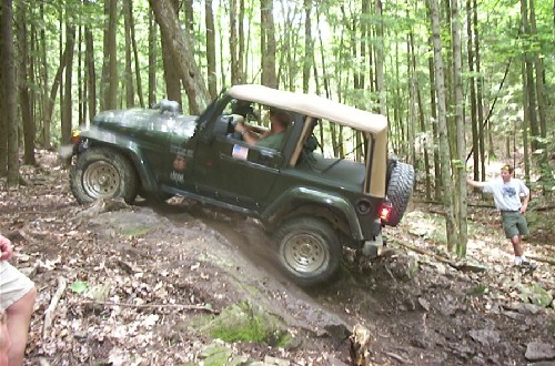Jeep navigating rocky trail
