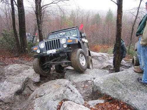 Jeep navigating rocky terrain; Long Island Off Road