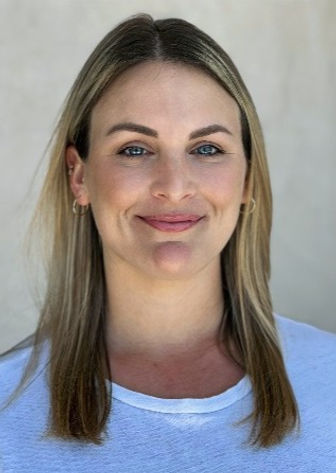 This is one of our agents Katey. She is smiling, has longer blond hair, and is a great agent for the Peter Home Sales team which is a part of BayBrook Realty.