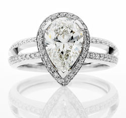 platinum-pearshape- diamond-halo- engagement-ring.jpeg