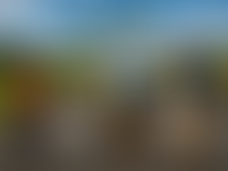 Three people stand at a forked road with signs saying "KM Success" and "Strengths." The road is marked "STRENGTHS" and "CHALLENGES."