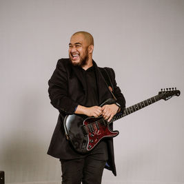 Guitarist working hard at being awesome!