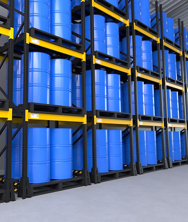 vecteezy_blue-barrels-in-the-warehouse-storage-stock-chemical_6024472_659-min.jpg