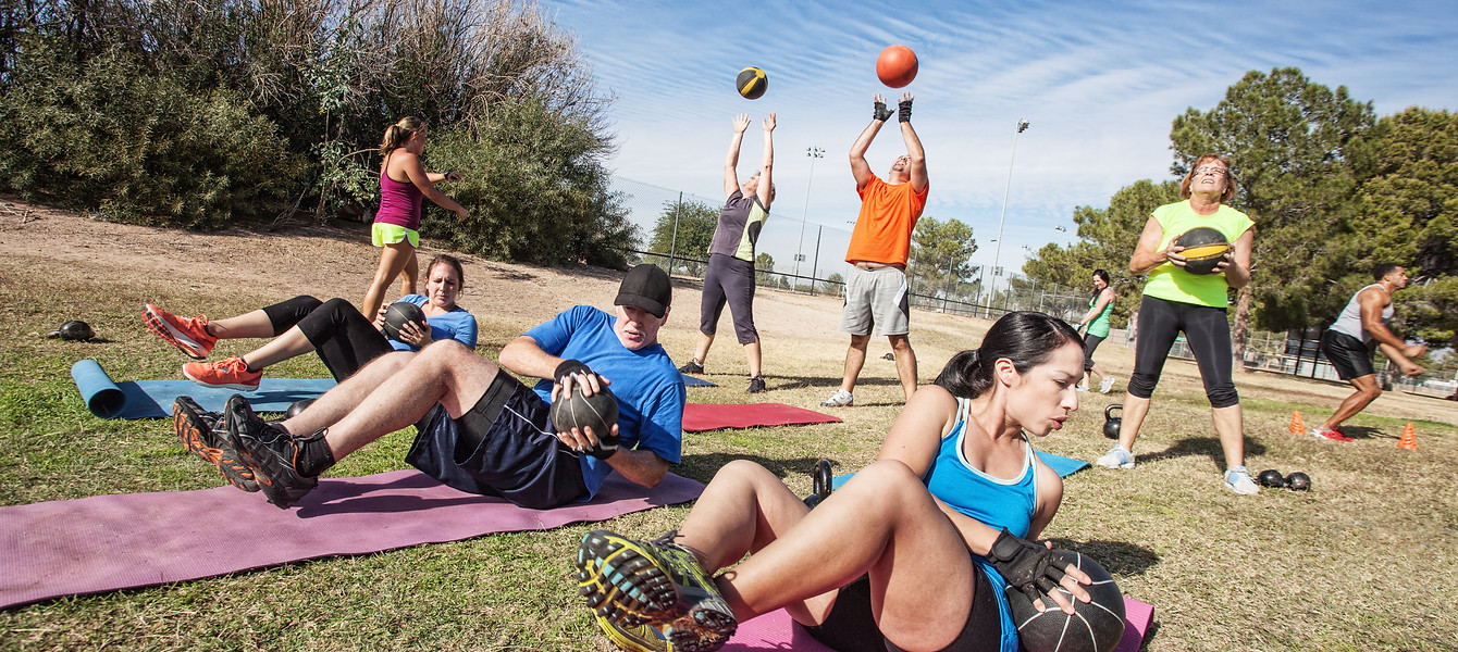group outdoors in a fitness class
