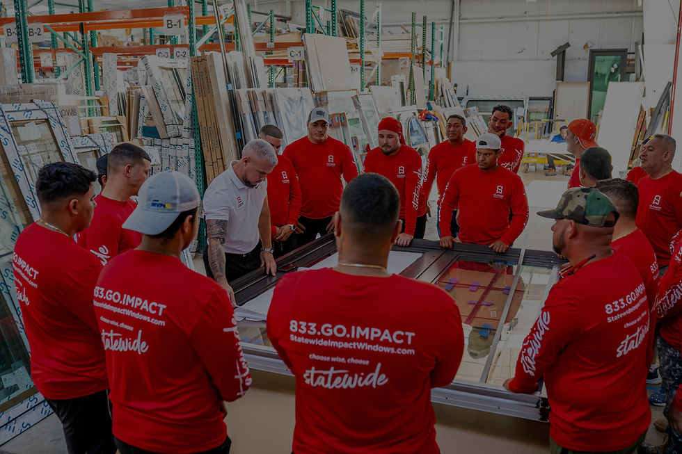 John Dyda standing in his company’s warehouse.