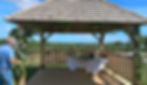 Tim decorating the Gazebo on a very windy day! at Cherry Barn
