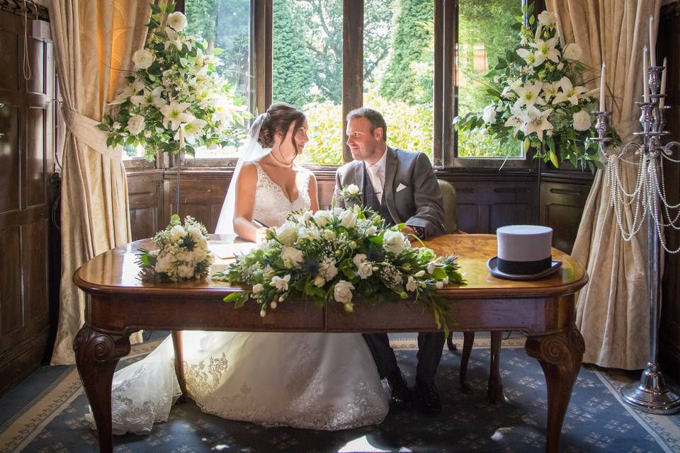 Ceremony table flowers with Pedestal arrangements at Highley Manor