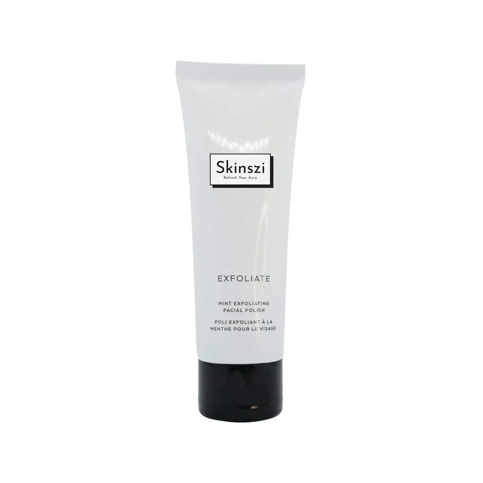 White tube of Skinszi exfoliating facial polish on a white backdrop, Skinszi.