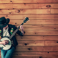 man holding banjo