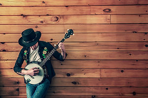 man holding banjo