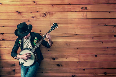 man holding banjo