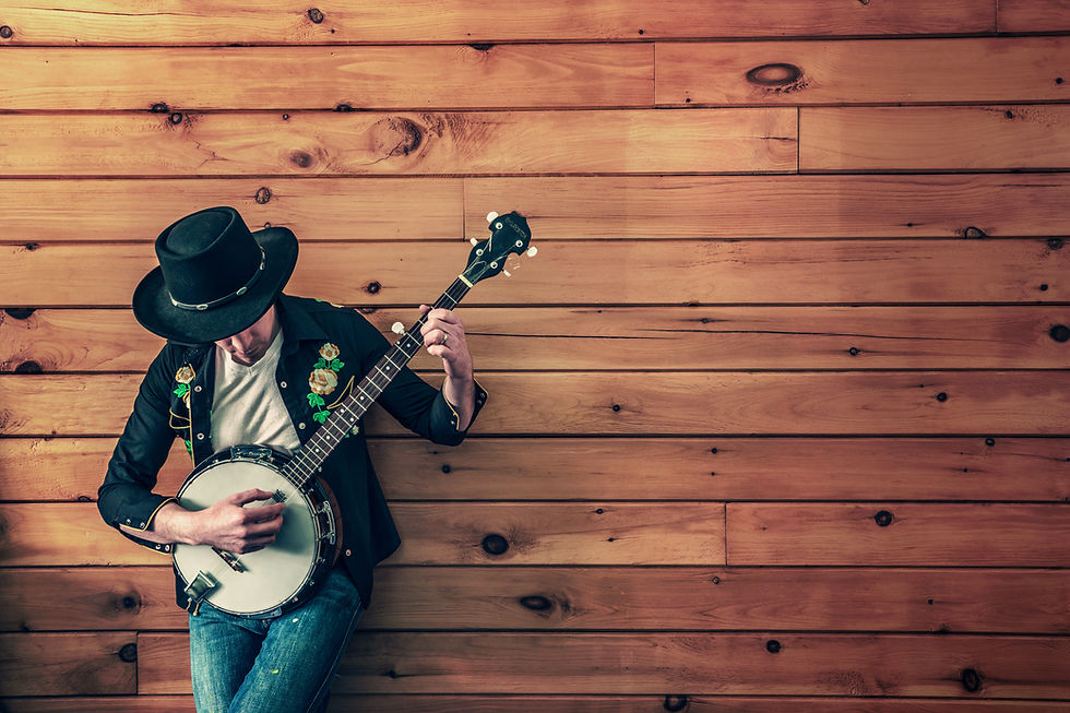 man holding banjo