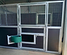 Stable door with a rotating feed trough for feeding from outside the stable.