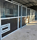 Custom-made stable panels, fitted on site.