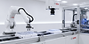 Bespoke automation system with robotic handling, inspection tooling and guarded machine build equipment