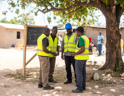 Firefly_A small group of  FOUR community patrol leaders gathered WEARING YELLOW VEST under